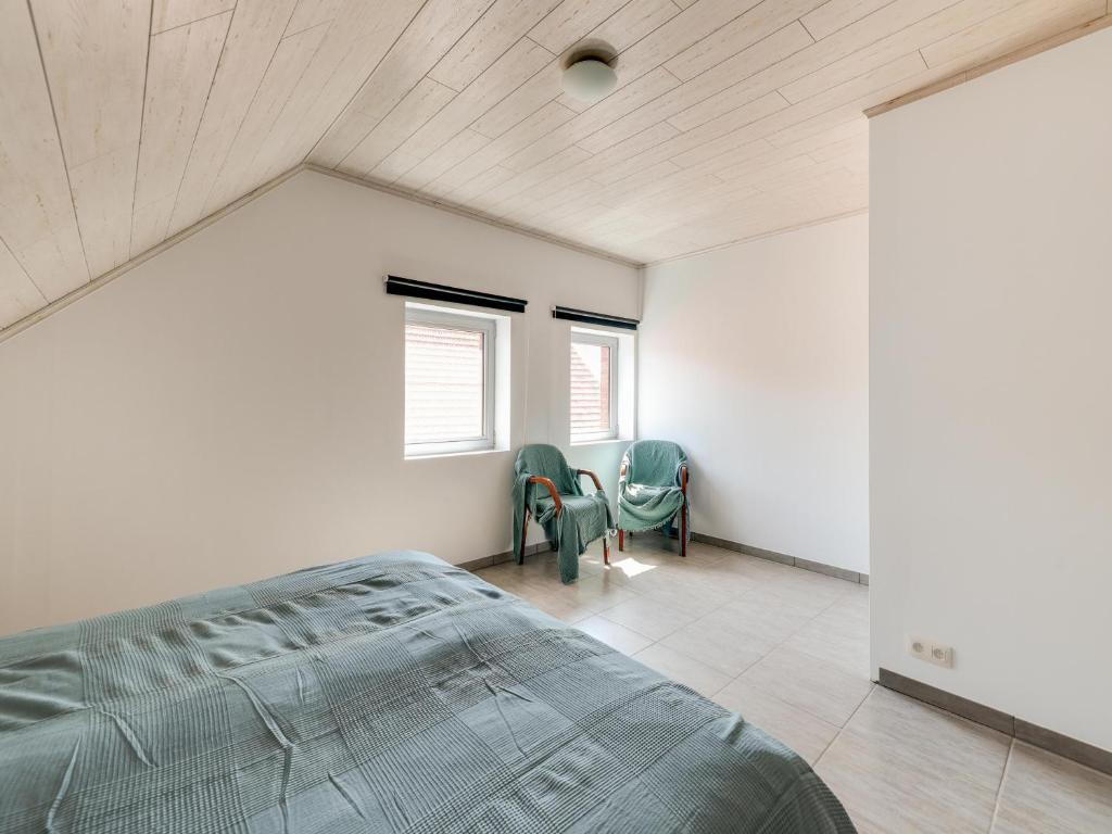 Postel nebo postele na pokoji v ubytování In de Wollekjes