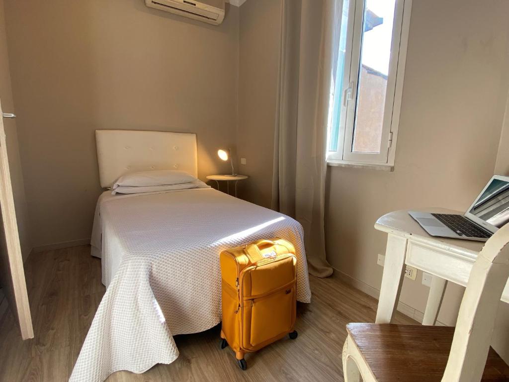 Postel nebo postele na pokoji v ubytování Orto Di Roma