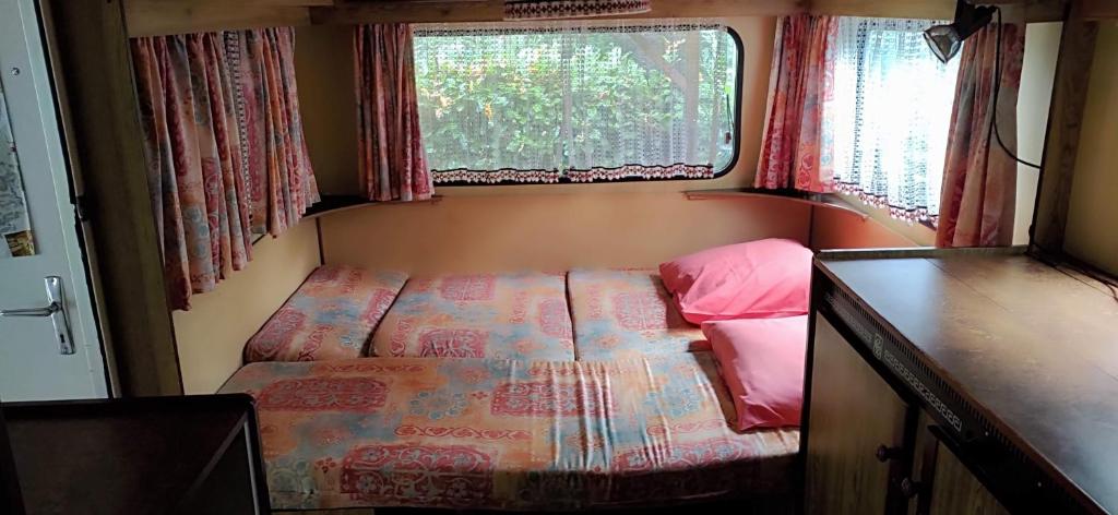 Postel nebo postele na pokoji v ubytování Camping Chon du Tarn