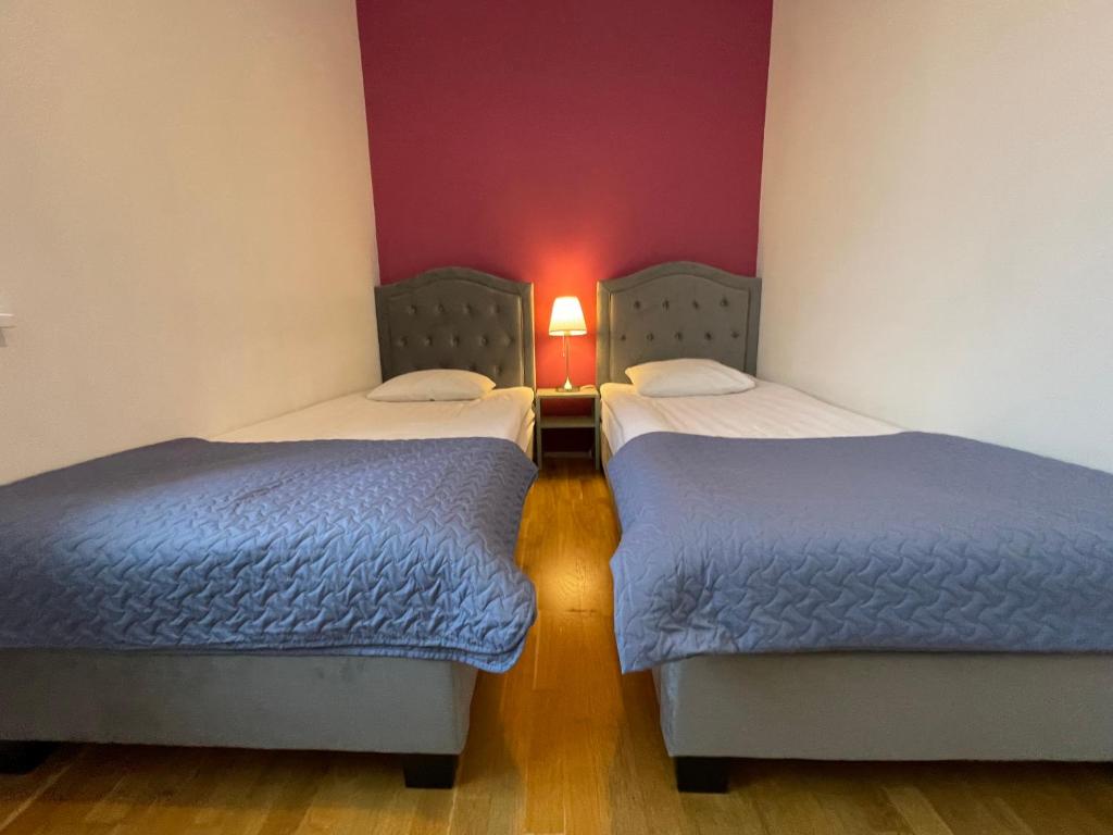 Postel nebo postele na pokoji v ubytování Old Town - Viru Apartment