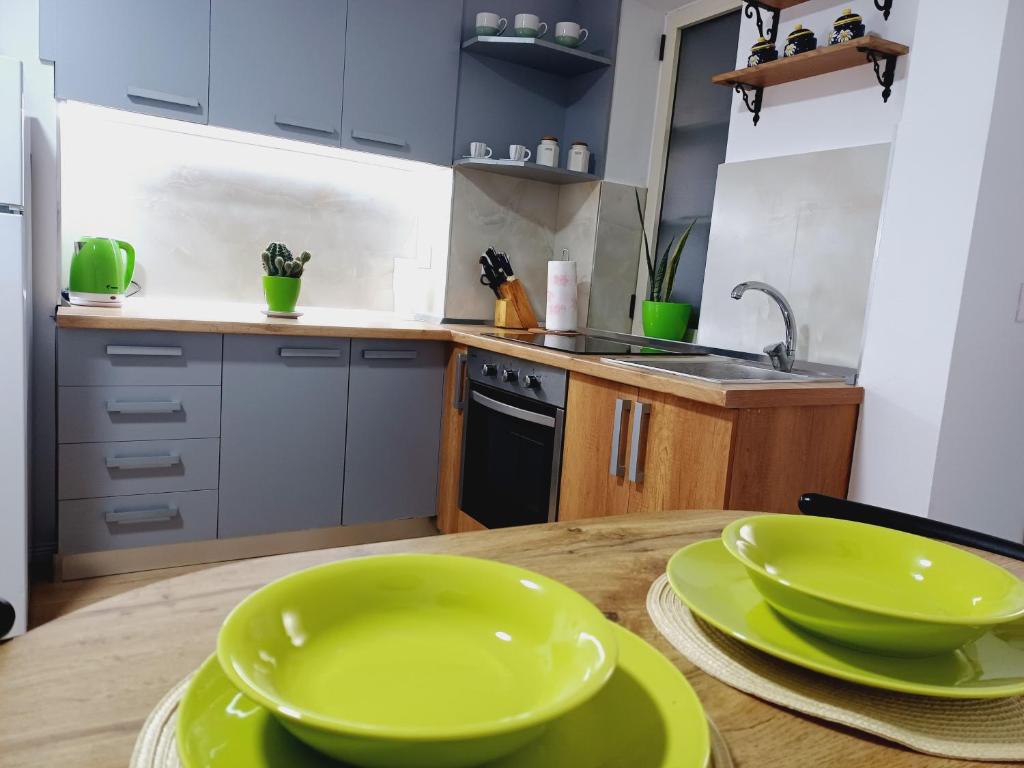 Kuchyň nebo kuchyňský kout v ubytování Regis Apartment