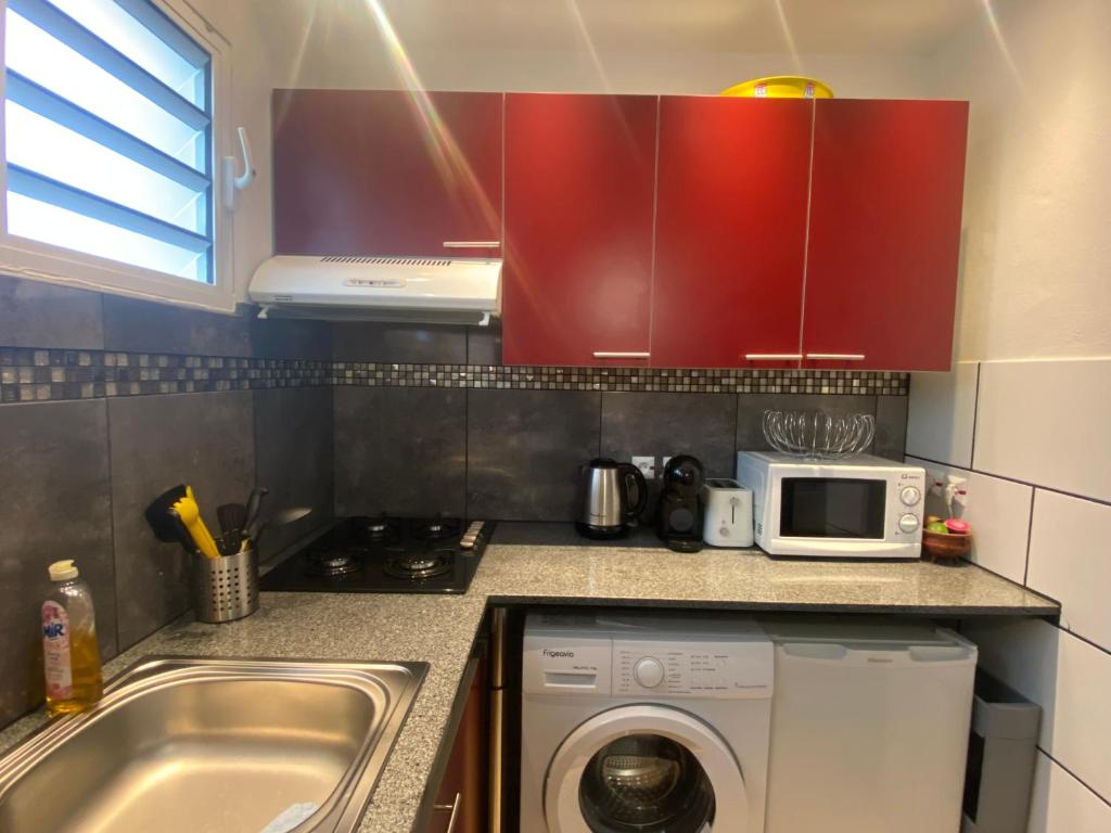 Kuchyň nebo kuchyňský kout v ubytování Happyhome
