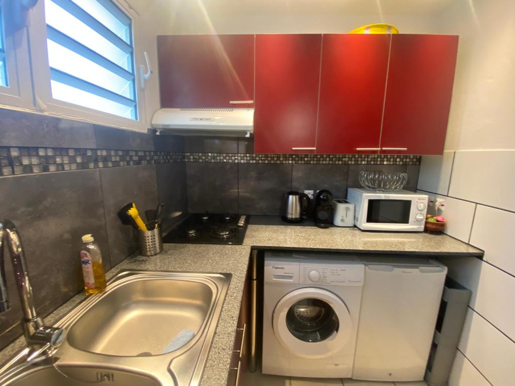 Kuchyň nebo kuchyňský kout v ubytování Happyhome
