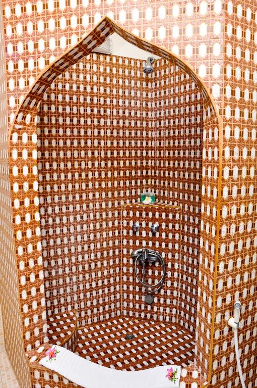 Koupelna v ubytování Forodhani Park Hotel