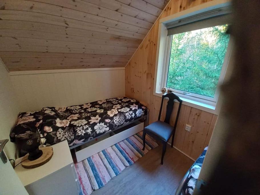 Postel nebo postele na pokoji v ubytování Fritidshus Hammare Hagfors