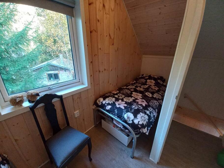 Postel nebo postele na pokoji v ubytování Fritidshus Hammare Hagfors
