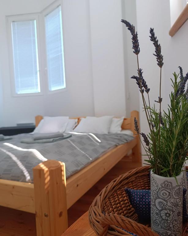 Postel nebo postele na pokoji v ubytování ToronySzoba
