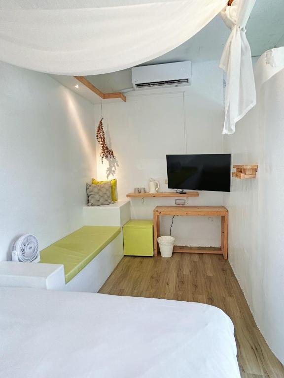Postel nebo postele na pokoji v ubytování White&Light B&B