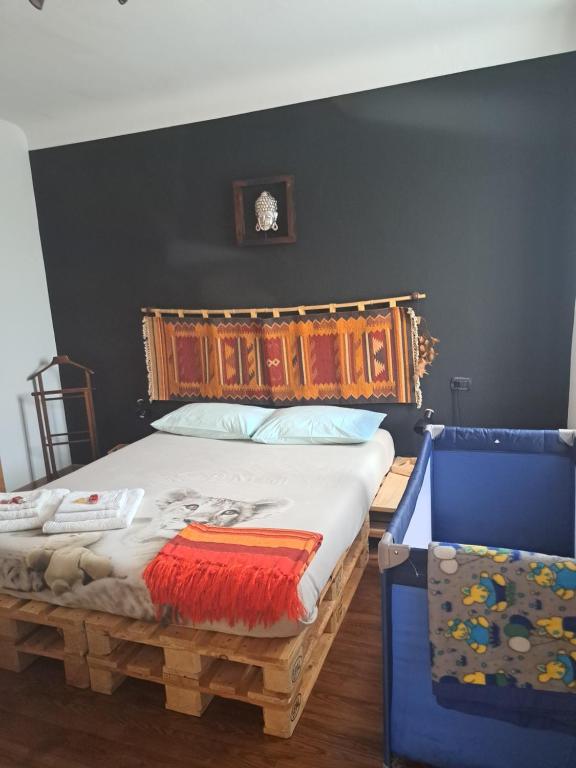 Postel nebo postele na pokoji v ubytování Casa Poldo