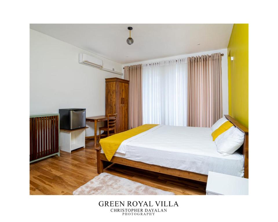 Postel nebo postele na pokoji v ubytování Green Royal Villa