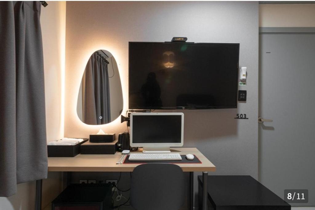 TV a/nebo společenská místnost v ubytování Ggumgguda Hotel