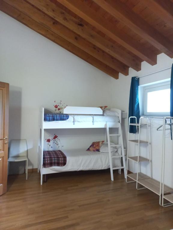 Postel nebo postele na pokoji v ubytování La Corte del Cigno