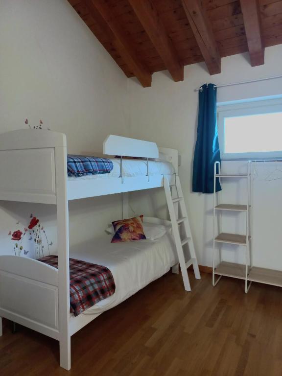 Postel nebo postele na pokoji v ubytování La Corte del Cigno