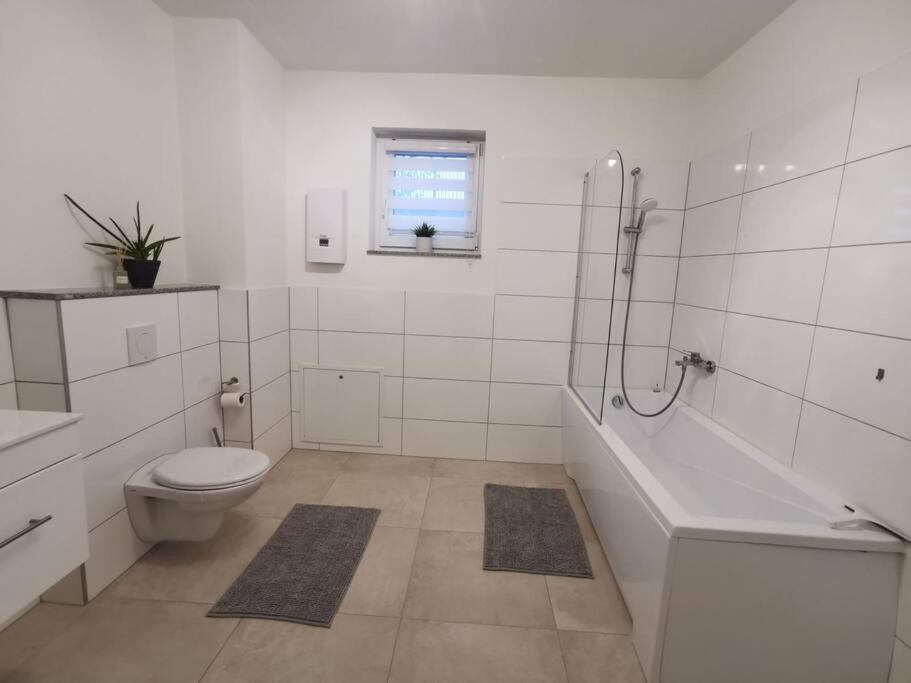 Koupelna v ubytování LOOT: Moderne Wohnung / Zentral