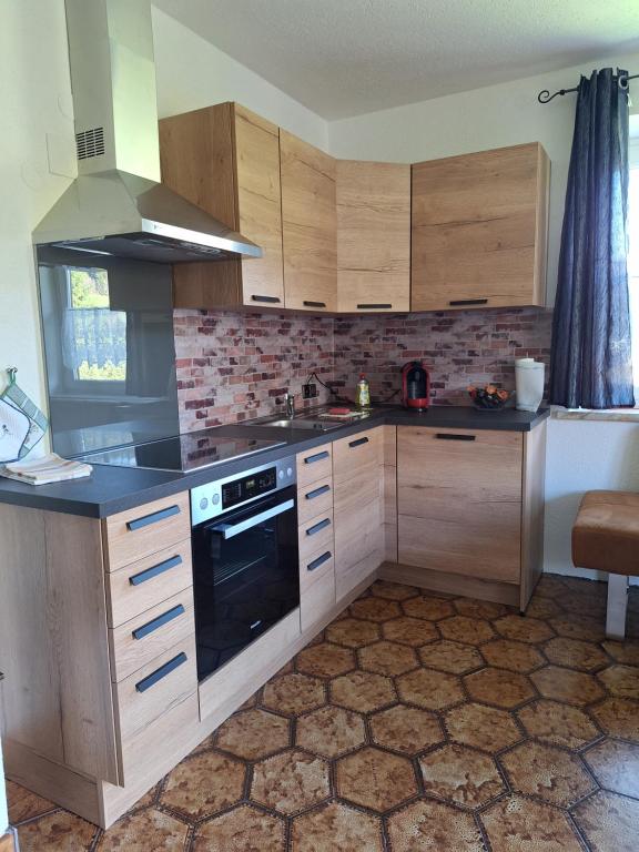 Kuchyň nebo kuchyňský kout v ubytování Ferienwohnung Schaller