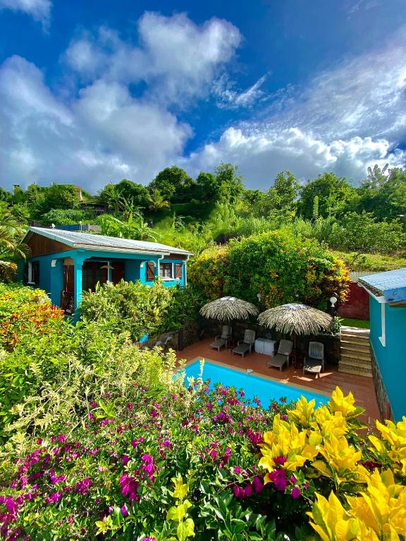 Zahrada ubytování LES VILLAS PAMEYAQUE 2 F2 avec 1 piscine et 1 F3 avec 1 piscine, Superbe Vue sur la mer