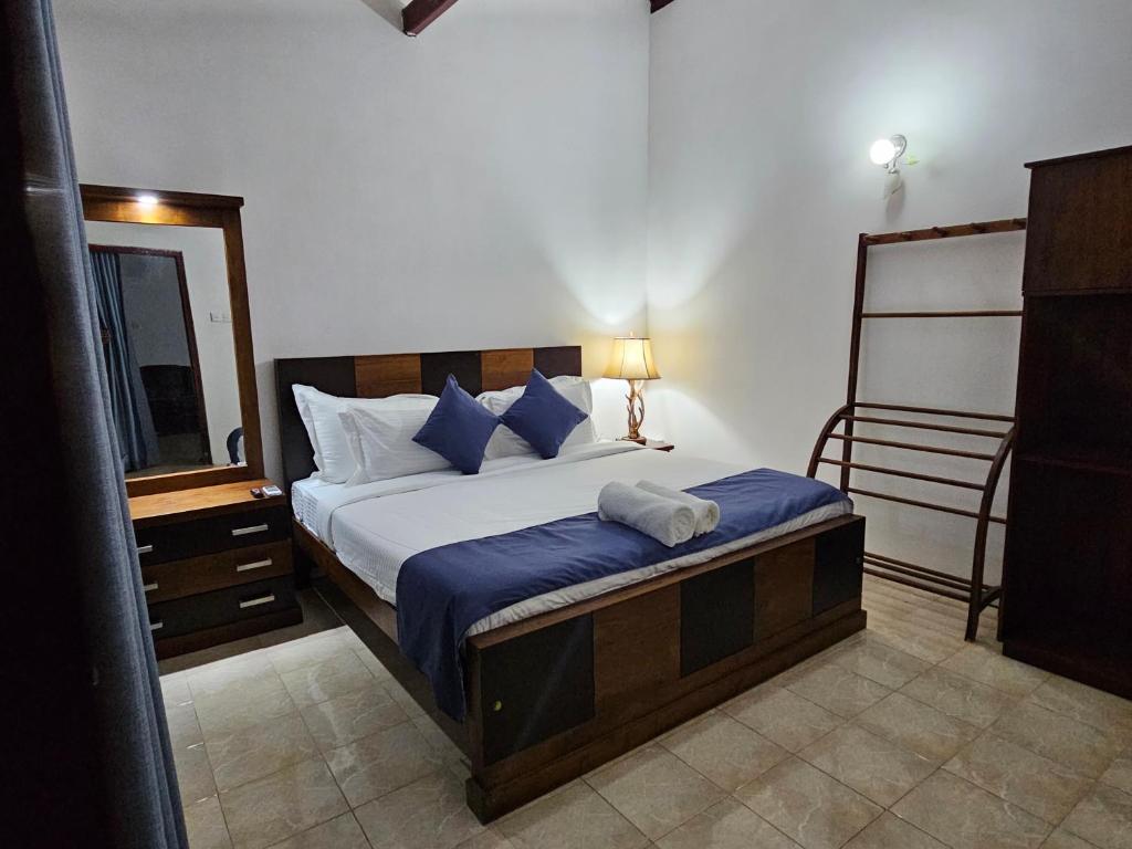 Postel nebo postele na pokoji v ubytování Ellakanda Nature Villa