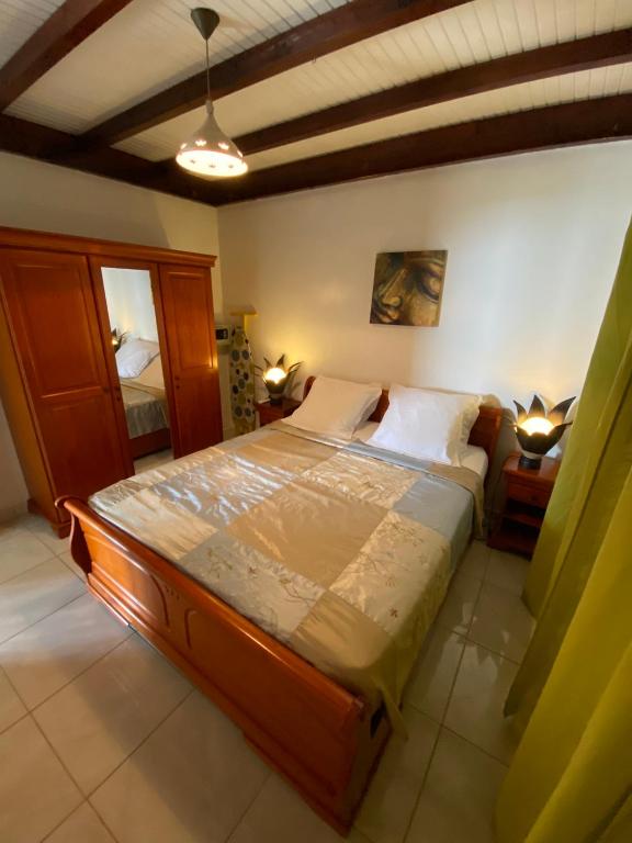 Postel nebo postele na pokoji v ubytování LES VILLAS PAMEYAQUE 2 F2 avec 1 piscine et 1 F3 avec 1 piscine, Superbe Vue sur la mer