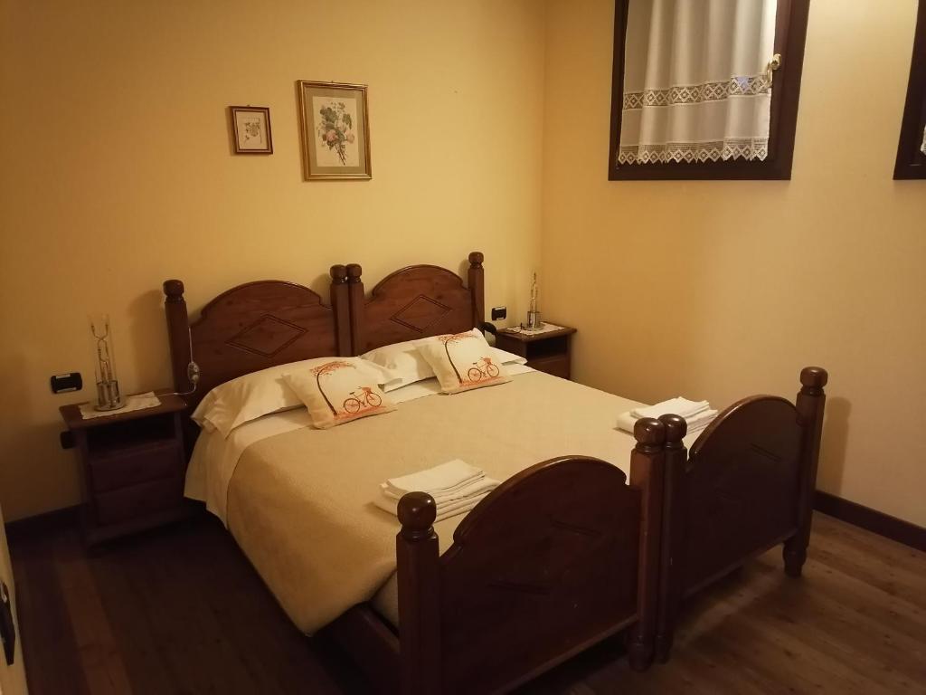 Posteľ alebo postele v izbe v ubytovaní Agriturismo Il Salice Ridente