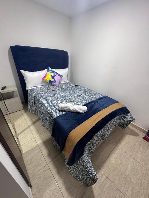 Postel nebo postele na pokoji v ubytování HOSPEDAJE SARY HOUSE
