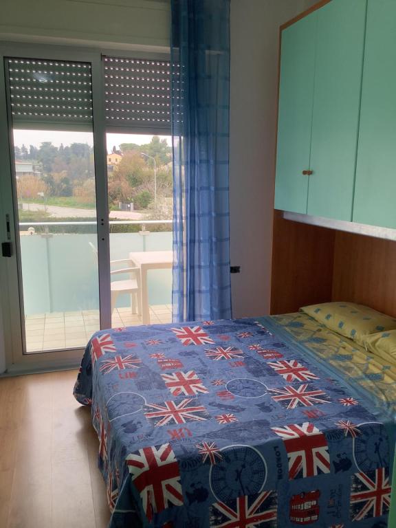 Postel nebo postele na pokoji v ubytování Oasi Mare
