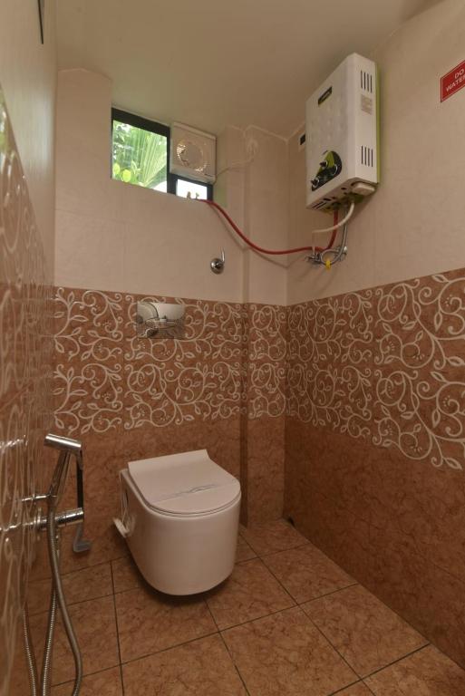Koupelna v ubytování Magni Home