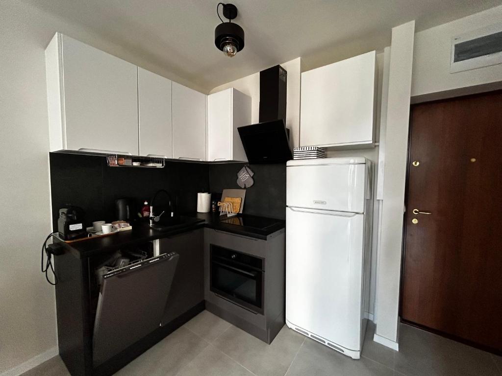 Kuchyň nebo kuchyňský kout v ubytování Sky Apartment Comfy Suite Pereca
