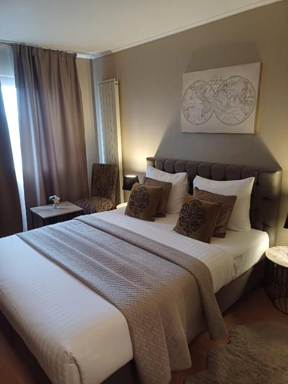 Postel nebo postele na pokoji v ubytování Park Hotel Airport