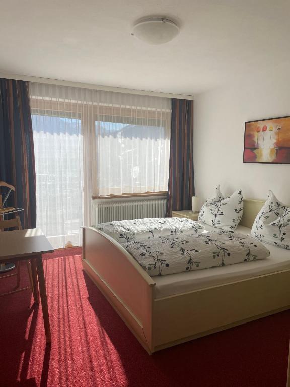 Postel nebo postele na pokoji v ubytování Ferienwohnung Jeller