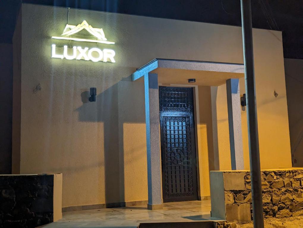 a building with a lvyota sign on the side of it at Luxor Rabath in Akhaltsikhe