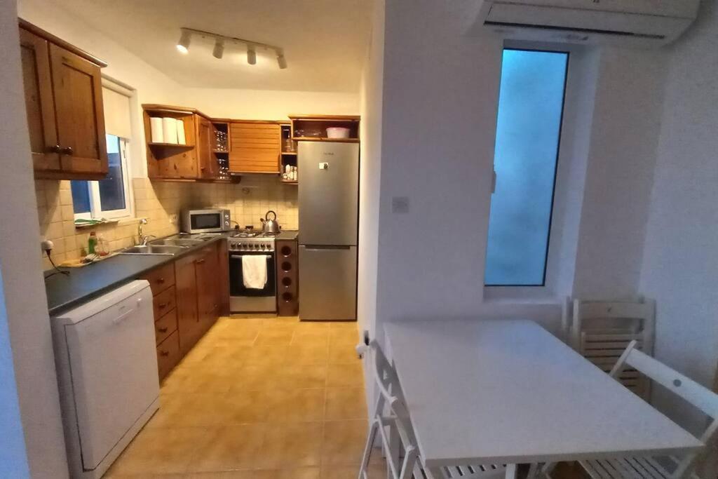 Kuchyň nebo kuchyňský kout v ubytování Sunset Suite