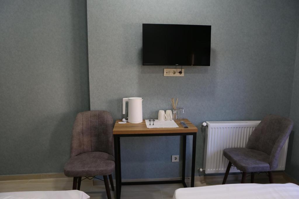 TV a/nebo společenská místnost v ubytování Luxor Rabath