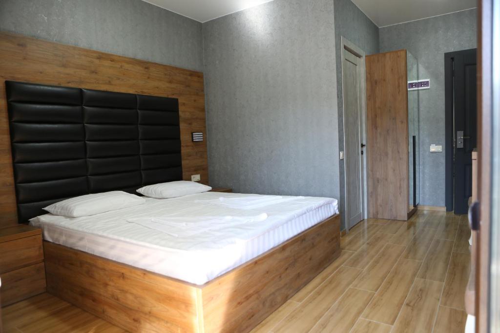 Postel nebo postele na pokoji v ubytování Luxor Rabath