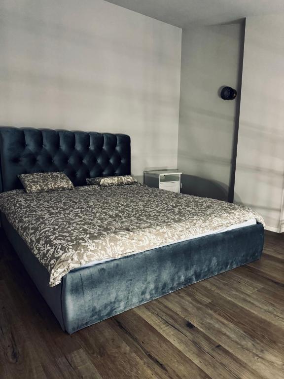 Postel nebo postele na pokoji v ubytování AJ Chocolate Vilnius