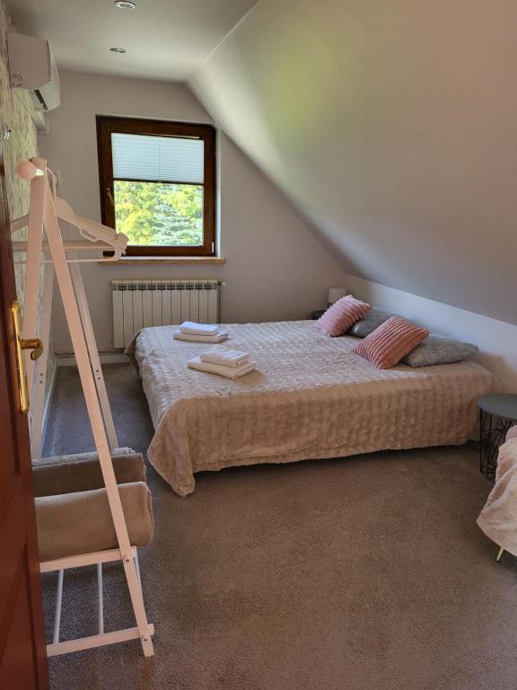 Posteľ alebo postele v izbe v ubytovaní Willa Sulimówka - Noclegi Zakliczyn dom basen bania sauna SPA