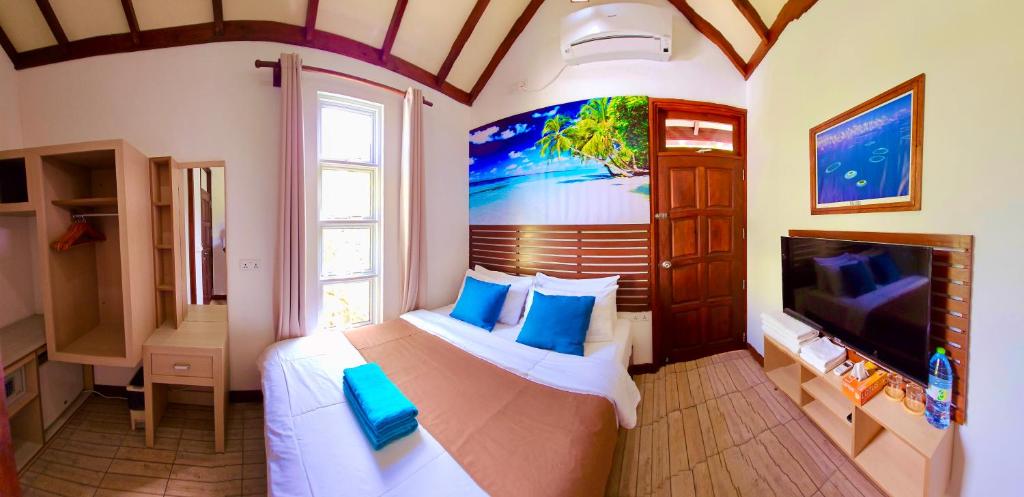 TV a/nebo společenská místnost v ubytování Beach Cottage