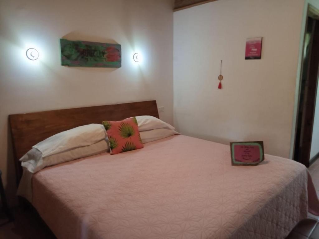 Postel nebo postele na pokoji v ubytování Quinta Esencia