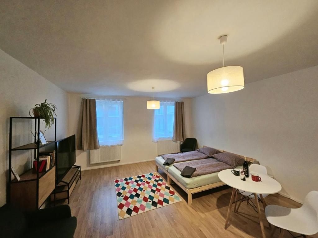 Postel nebo postele na pokoji v ubytování Apartmány Svitavy