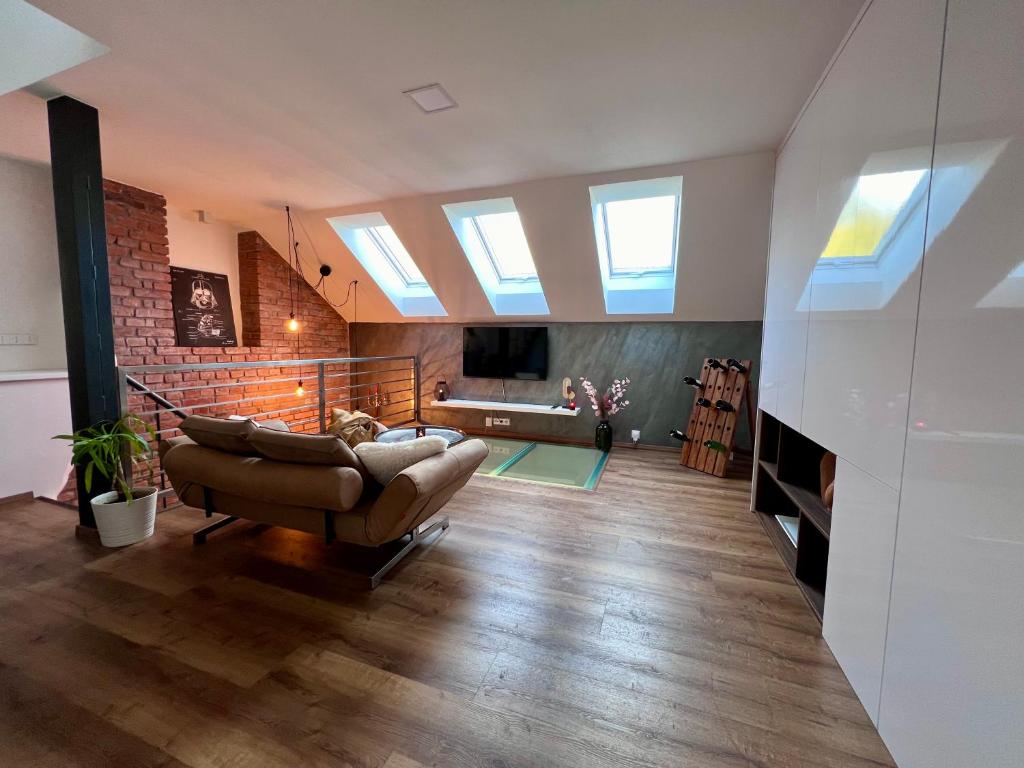 Μια τηλεόραση ή/και κέντρο ψυχαγωγίας στο Loftový apartmán Laura