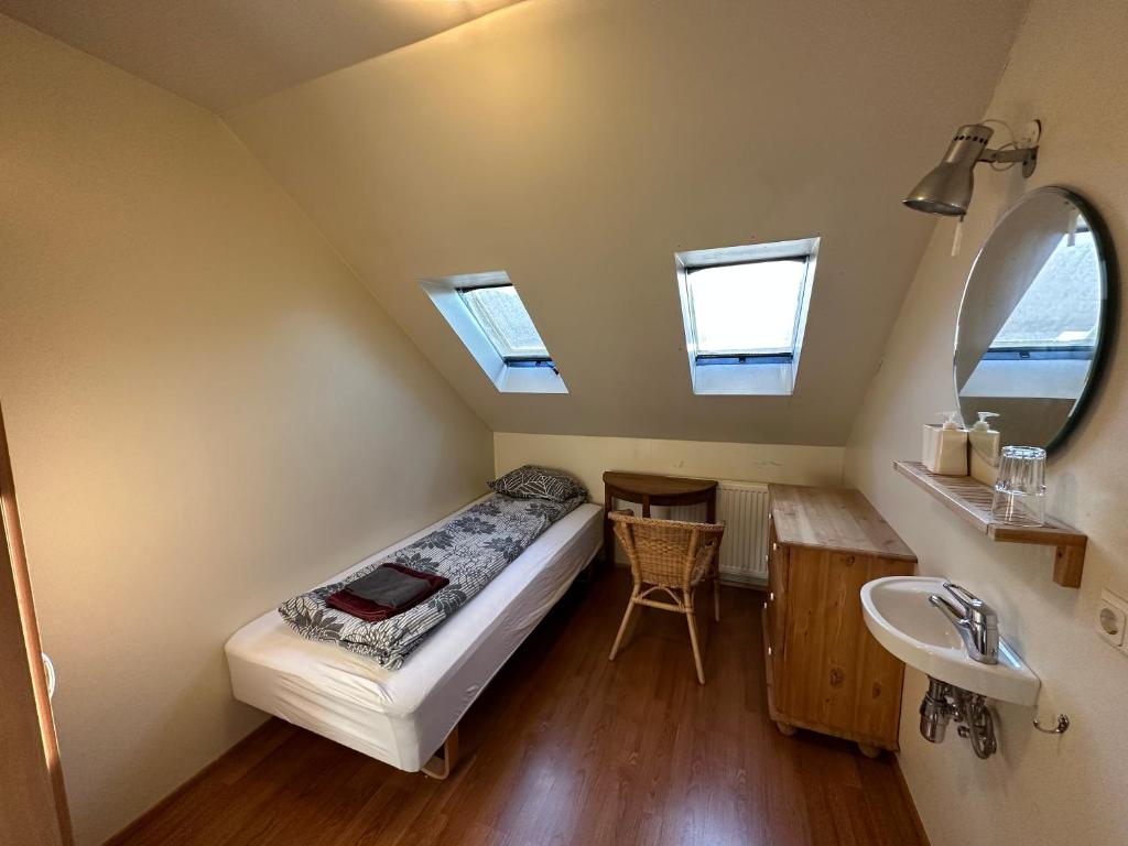 Una cama o camas en una habitación de Tærgesen Guesthouse