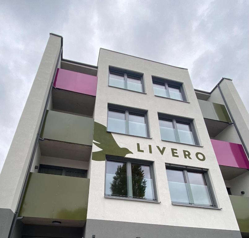 a building with the liverro sign on it at Livero Apartments in Sankt Pölten
