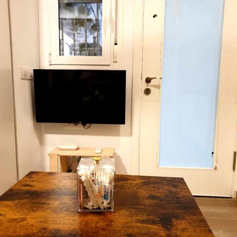Televízia a/alebo spoločenská miestnosť v ubytovaní Estudio centro Tarifa