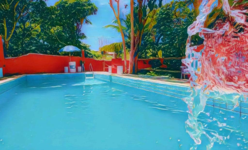 Bazén v ubytování Pousada Cantinho do Sagui nebo v jeho okolí