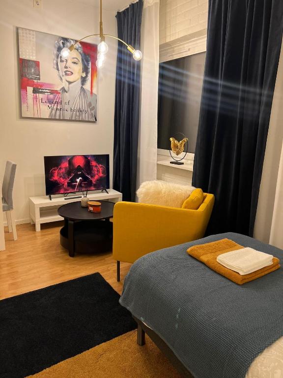 Postel nebo postele na pokoji v ubytování Noah Longstay Borås