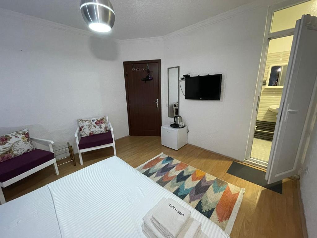 Postel nebo postele na pokoji v ubytování Deni house