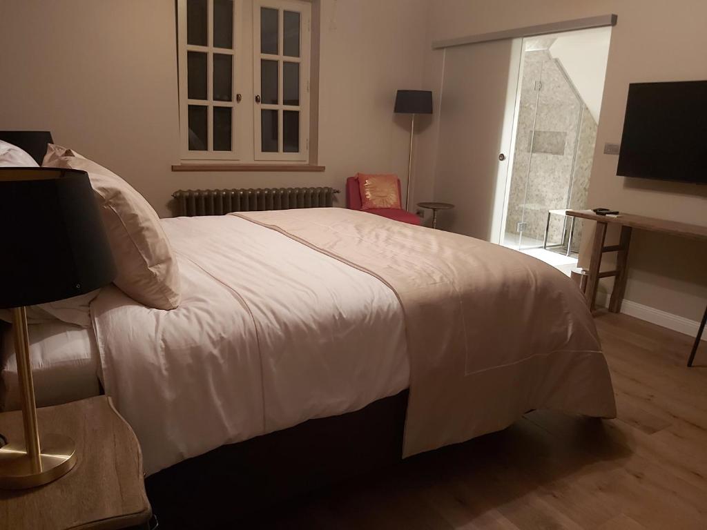 Postel nebo postele na pokoji v ubytování B&B Asmara