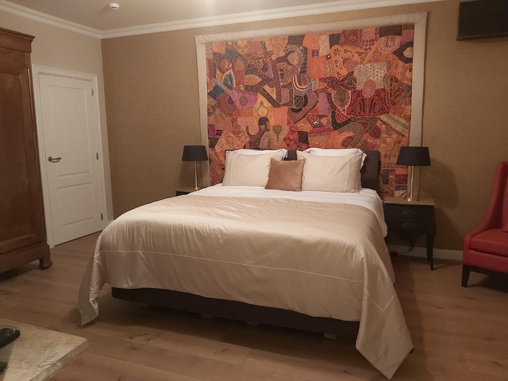 Postel nebo postele na pokoji v ubytování B&B Asmara