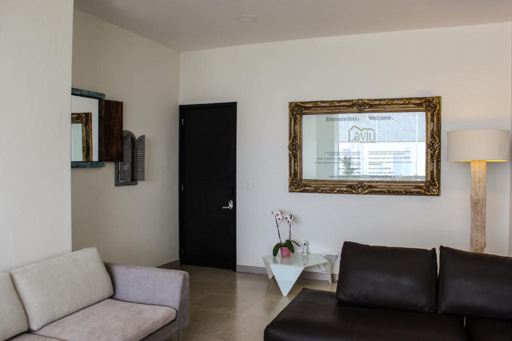 Area soggiorno di Laviu B&B Luxe Suites