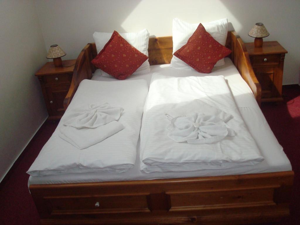 Łóżko lub łóżka w pokoju w obiekcie Sport hotel POMI
