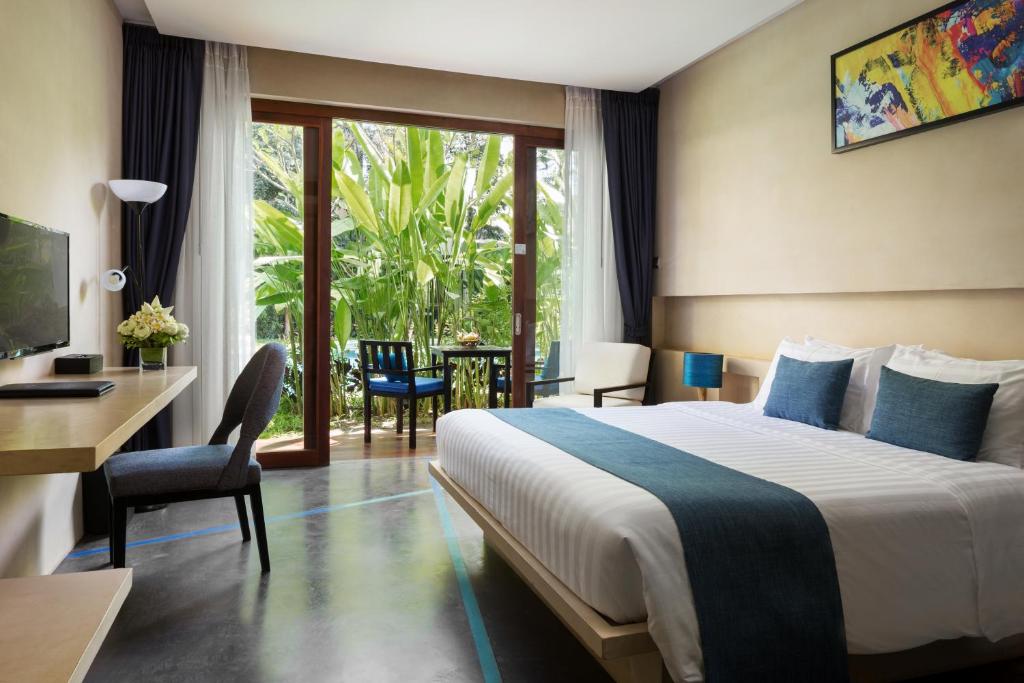 Postel nebo postele na pokoji v ubytování Sakmut Boutique Hotel